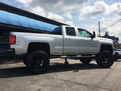 2015 Chevy Silverado 2500HD with 5 inch Zone Offroad lift kit and 20 inch Fuel Offroad Vapor wheels and 37 inch Nitto Ridge Grappler tires