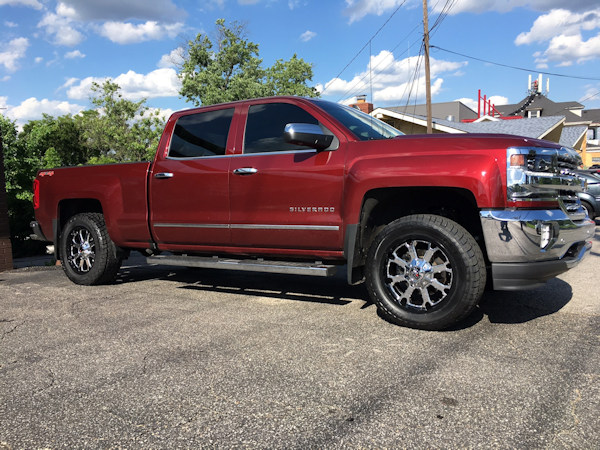 2017 Chevy Silverado 1500 with a Zone Offroad leveling kit and 20 inch XD Buck wheels and 33 inch Radar AT5 tires 