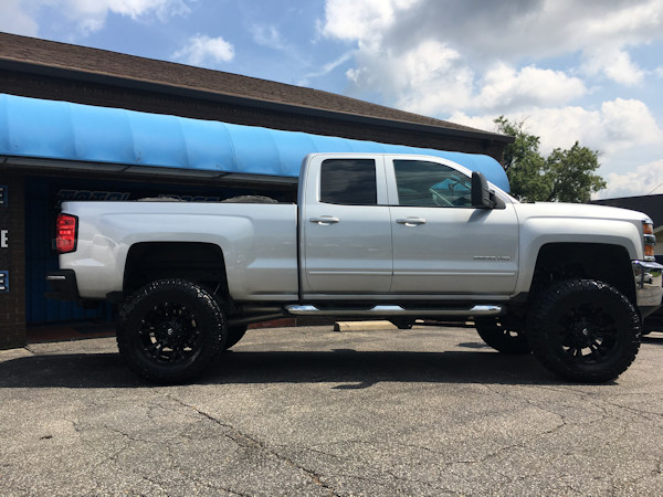 2015 Chevy Silverado 2500HD with 5 inch Zone Offroad lift kit and 20 inch Fuel Offroad Vapor wheels and 37 inch Nitto Ridge Grappler tires 