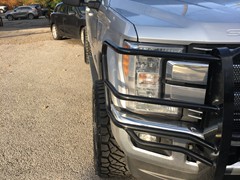 2017 Ford F-250 with Rough Country leveling kit and 20x10 Fuel Offroad Cleaver wheels and 295/60/20 Nitto Ridge Grappler tires
