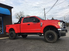 2017 Ford F-350 with a 4 inch Zone Offroad lift kit and 20 inch XD Misfit wheels and 35 inch Nitto Terra Grappler tires.