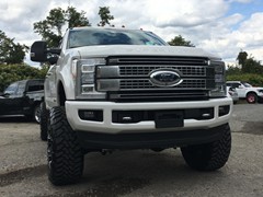 2017 Ford F-350 with a 6 inch Zone Offroad lift kit with Fox shocks and Steering Stabilizer with 22x12 Fuel Offroad Assault wheels and 37 inch Toyo Open Country MT tires with AFE 5 inch exhaust and BAK Industries MX tonneau cover