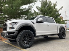Raptor, with a Readylft leveling kit, 20x9 Gloss Black Fuel Blitz and 35x12.50x20 Nitto Ridge Grappler’s