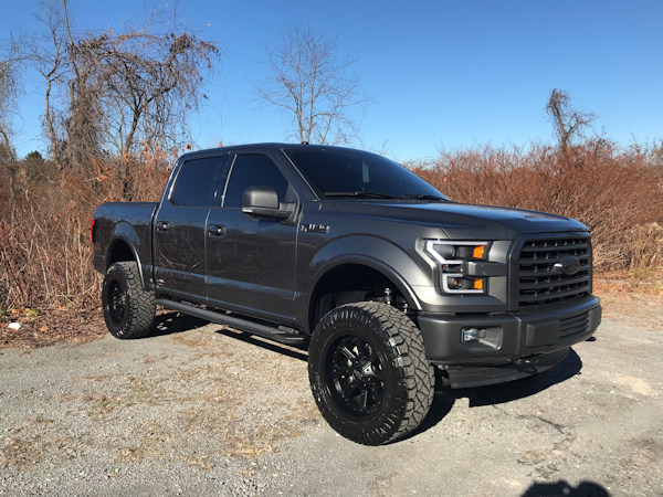 Jordan Leggett of the new york jets, 2017 f150, 6in. Rough Country Lift, 20in. Moto Metals, 35x12.50x20 Nitto Ridge Grapplers, dual Magunflow exhaust, K&N cold air intake, Bullydog tuner, Anzo headlights and taillights,  full JL Audio sound system 
