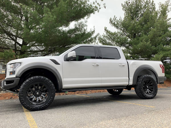 Raptor, with a Readylft leveling kit, 20x9 Gloss Black Fuel Blitz and 35x12.50x20 Nitto Ridge Grappler’s 