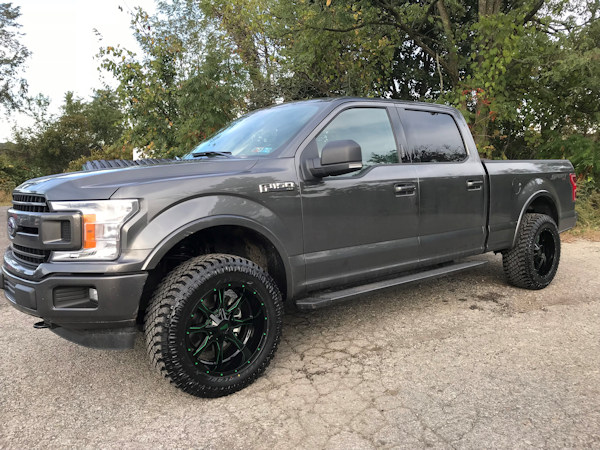 2018 FordF150, with Rough Country leveling kit, 20x10 Moto Metal 970 custom painted in candy green, with 33x12.50x20 Atturo Trailblade XT’s 