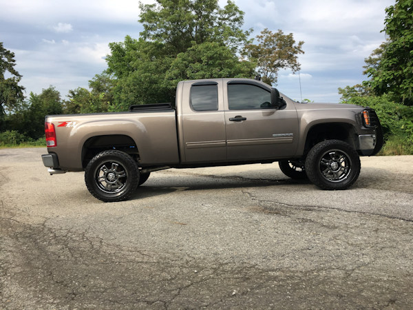 2008 GMC Sierra 1500 with 6.5 inch Zone Offroad lift kit with 20 inch wheels and 35 inch Mickey Thompson ATZ tires 