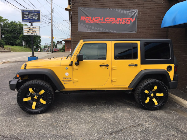 Jeep Wrangler with 2 inch Teraflex lift kit and 20x9 Rockstar 2 wheels and 33 inch Nitto Ridge Grappler tires 