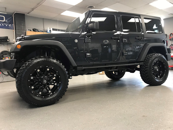2018 Jeep Wrangler Jk, 3in. Rough Country Lift, 20x10 Fuel Hostage wrapped in 35x12.50x20 Radar R7 M/T’s 