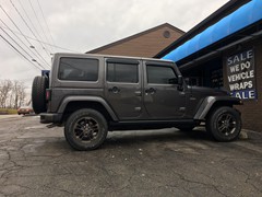 2016 Jeep Wrangler with 4 inch Zone Offroad lift kit withFox shocks and 20x10 Fuel Maverick wheels with 37 inchNitto Ridge Grappler tires and Teraflex HD spare tire mount