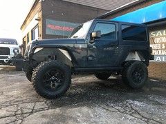 2016 Jeep Wrangler with 4 inch Rough Country lift kit and 32 inch Mastercraft MXT tires
