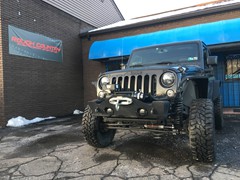 2016 Jeep Wrangler with 4 inch Rough Country lift kit and 32 inch Mastercraft MXT tires
