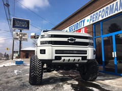 2016 Chevy Silverado 2500HD with 12 inch Cognito lift kit, 22x14 Fuel Forged FF19 wheels and 40x15.50x22 Toyo Open Country MT tires.  Rigid Industries 40 inch LED light bar custom mounted in the front bumper, Rigid Industries Dually XL fog light conver...