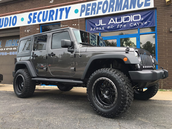 2016 Jeep Wrangler with 3 inch Zone Offroad lift kit with Fox shocks and 20x10 Fuel Offroad Anza wheels with 35 inch Mastercraft MXT tires 