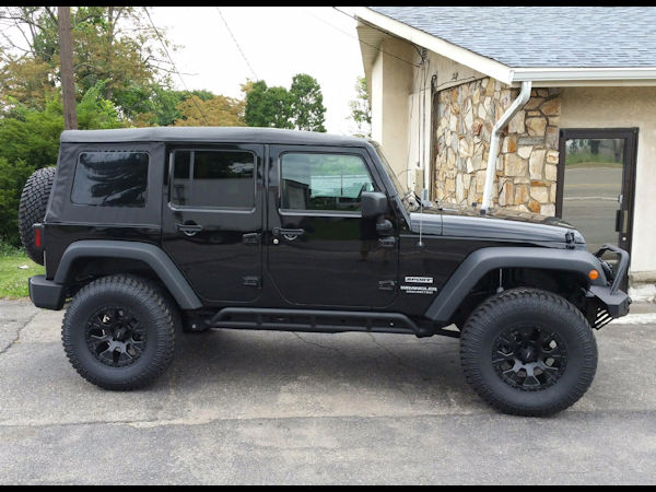 2016 Jeep Wrangler with a 3 inch Zone Offroad lift kit with 17 inch Helo 878 wheels and 35 inch Atturo Trail Blade MT tires 