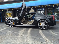 Cadillac XLR-V with Vertical door kit installed c-06201403