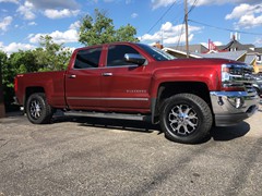 2017 Chevy Silverado 1500 with a Zone Offroad leveling kit and 20 inch XD Buck wheels and 33 inch Radar AT5 tires