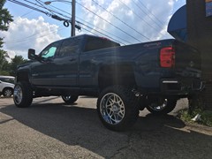 2016 Chevy Silverado 2500 with 6 inch Rough Country lift kit and 22x12 Hostile Sprocket wheels with 35 inch RBP tires