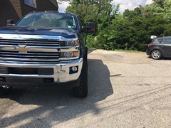 2016 Chevy Silverado 2500 with 6 inch Rough Country lift kit and 22x12 Hostile Sprocket wheels with 35 inch RBP tires