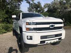 2018 Chevy 2500, 4.5in BDS Lift, 20x9 +20 offset Fuel Sledge ,35x12.50x20 Toyo Open Country A/T 2, and custom painted grill and chrome delete