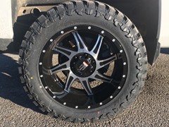 2015 Chevy Silverado 1500 with Rough Country 3.5 inch lift kit with 20x10 inch American Truxx AT162 Vortex wheels and 33 inch Atturo Trail Blade MT tires
