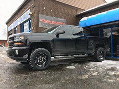 2015 Chevy Silverado 1500 with 3.5 inch Rough Country lift and 20x10 Fuel Offroad Turbo wheels and 33 inch Atturo Trail Blade MT tires