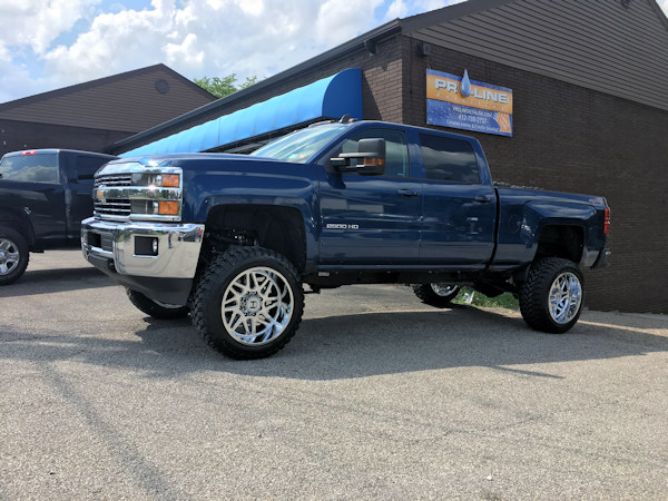 2016 Chevy Silverado 2500 with 6 inch Rough Country lift kit and 22x12 Hostile Sprocket wheels with 35 inch RBP tires 