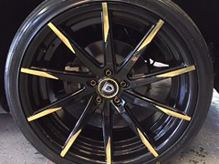 2015 Dodge Challenger with custom Gold Chrome vinyl graphics and 22 inch Lexani CSS-15 wheels with Gold Chrome accents.  2 Kicker Comp R 12 inch subs with Kicker KX800.1 amp.