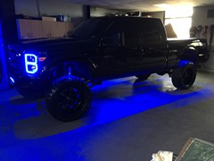 2013 Ford F-250 in for Oracle Led Halo headlights, LED concepts light bar, Rave Sport HID Kit, Rigid Industries Rock lighting, custom blue tinting on wheels, F250 emblems