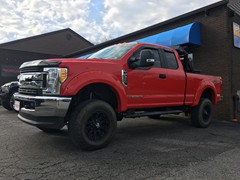 2017 Ford F-350 with a 4 inch Zone Offroad lift kit and 20 inch XD Misfit wheels and 35 inch Nitto Terra Grappler tires.