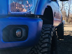 Cam Thomas of the kanas city chiefs, 2012 F250 , wrapped in 3m Satin Mystic Blue, 6in. Rough Country Lift, custom painted 22in. Fuel Maverick, 37x13.50x22 Toyo Open Country M/T, Full JL audio system with 4-12w6’s in the bed, and key start converted to a push button start