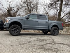 2019 Ford F-150 with a 4 inch ProComp lift kit and LRG wheels with 33’s
