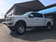Ford Superduty with Rough Country leveling kit and 18x9 XD Monster wheels and 35 in Nitto Ridge Grappler tires