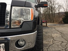 Ford F-150 with 2 inch Rough Country leveling kit and 22x10 XD839 wheels and 33 inch Radar Renegade MT tiresf0307190303