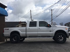 2016 Ford F-250 with Readylift SST kit and 20x10 Moto Metal MO970 wheels and 35 Toyo Open Country MT tires