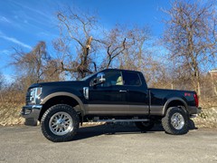 2019 Ford F-250 with 2.5 inch Readylift leveling kit and 20x9 Fuel Offroad Titan wheels and 37 inch Nitto Ridge Grappler tires and Flowmaster Force II exhaust