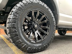 Raptor, with a Readylft leveling kit, 20x9 Gloss Black Fuel Blitz and 35x12.50x20 Nitto Ridge Grappler’s