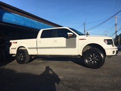 2013 Ford F-150 with a 3 inch Rough Country lift kit and 18x9 Fuel Throttle wheels and 35 inch Radar Renegade MT tires