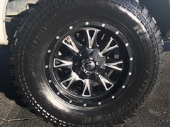 2013 Ford F-150 with a 3 inch Rough Country lift kit and 18x9 Fuel Throttle wheels and 35 inch Radar Renegade MT tires