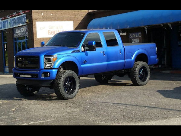 2013 Ford F-250 in for Oracle Led Halo headlights, LED concepts light bar, Rave Sport HID Kit, Rigid Industries Rock lighting, custom blue tinting on wheels, F250 emblems 