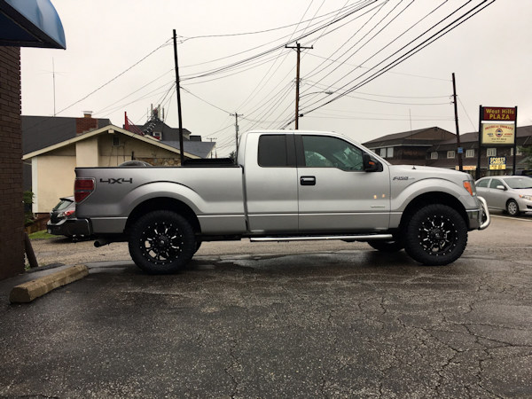2013 Ford F-150 with a Rough Country leveling kit and 20x9 Fuel Offroad Krank wheels with 295/60/20 Nitto Ridge Grappler Tires 