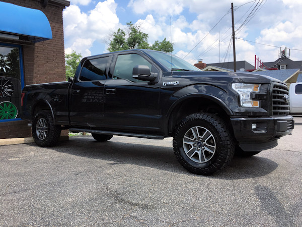 2016 Ford F-150 with a Zone Offroad leveling kit and 295/70/18 Nitto Ridge Grappler tires 
