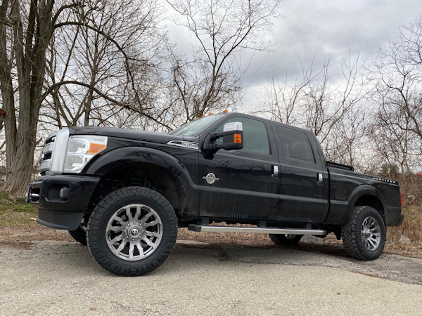2016 Ford F-350 with Rough Country leveling kit and 20x9 Fuel Offroad Blitz wheels and 295/65/20 Nitto Ridge Grappler tires 