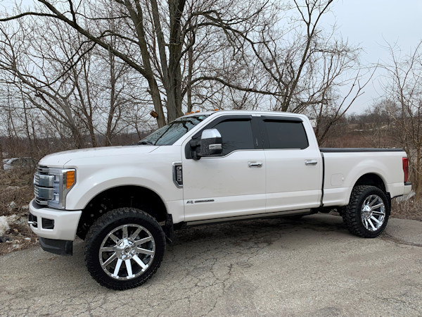 2019 F250 Platinum, with a Rough Country leveling kit,22x10 Fuel Contra and 35x12.50x22 Radar R7 M/T’s 