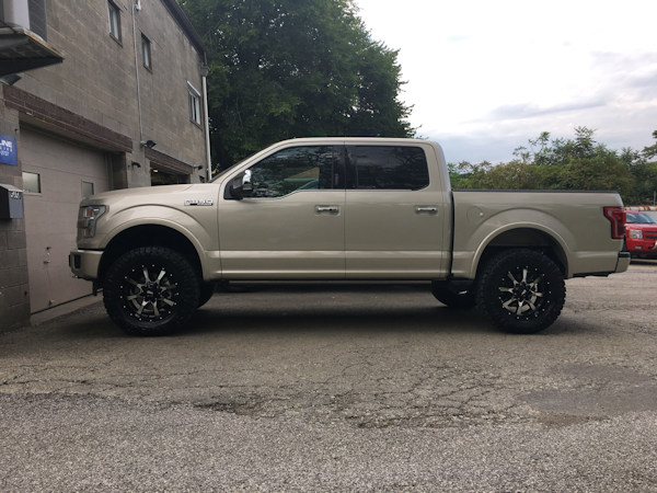 2017 Ford F-150 with 3.5 inch Rough Country lift and 20x9 Moto Metal MO970 wheels with 35 inch Nitto Ridge Grappler tires 