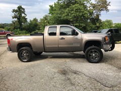 2008 GMC Sierra 1500 with 6.5 inch Zone Offroad lift kit with 20 inch wheels and 35 inch Mickey Thompson ATZ tires