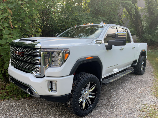 2020 GMC Denali 2500hd. With a zoneoffroad leveling kit and 22x10 Motometal 2pc. Wheels and 35x12.50x22 Nitto Ridge Grapplers 