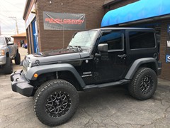 Jeep Wrangler with 3 inch Zone Offroad lift kit with upgraded Fox shocks and 18 inch XD Grenade wheels and 35 inch BF Goodrich All Terrain TA/KO2 tires.