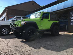 2013 Jeep Wrangler with a 3 inch Rubicon Express lift kit with 17 inch Mayhem Riot wheels and 315/70/17 BF Goodrich All Terrain TA tires