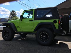 2013 Jeep Wrangler with a 3 inch Rubicon Express lift kit with 17 inch Mayhem Riot wheels and 315/70/17 BF Goodrich All Terrain TA tires